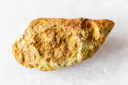 Preview: sample of raw beaverite-cu rock on white marble
