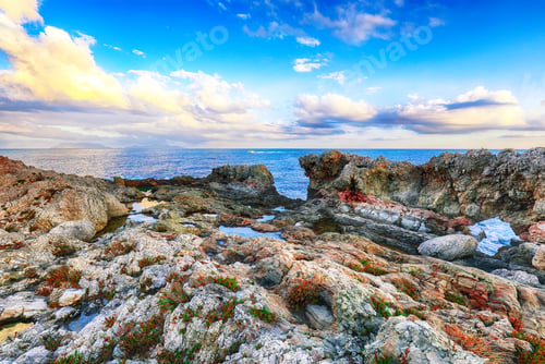 Preview: Dramatic spring sunset on the the cape Milazzo panorama of nature reserve Piscina di Venere.