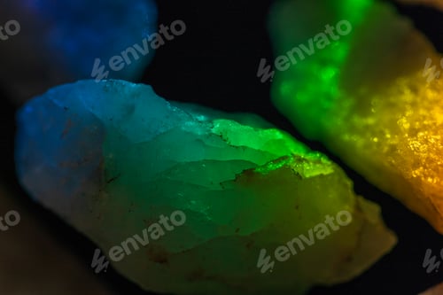 Preview: natural quartz crystal close up in green light spectrum