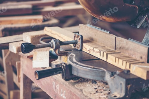 Preview: woodworking workshop of carpenters work table with different tools and wood cutting stand