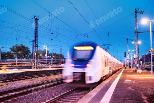 Preview: Fast train on the railway station. Composition with transport. Concept and idea at transportation it