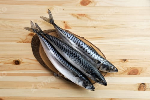 Preview: Frozen mackerel on wooden plate