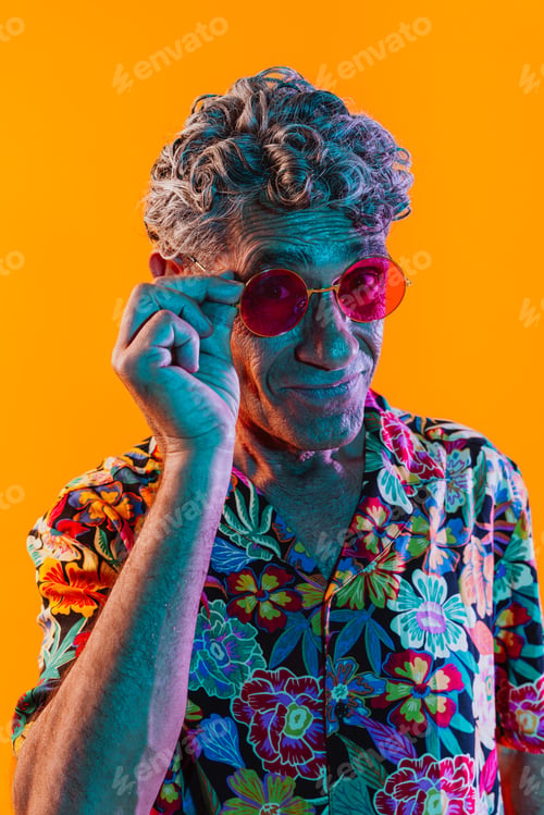 Preview: Senior man posing in studio.