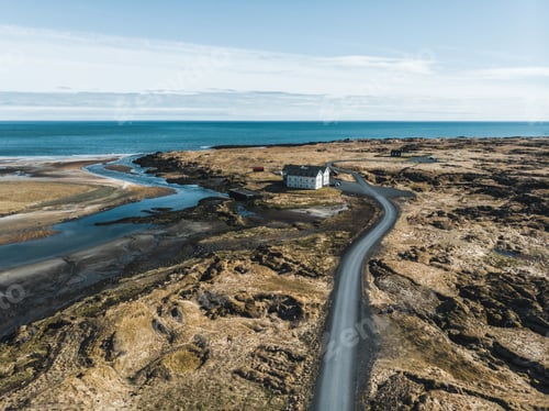 Preview: aerial view of houses and road on seashore, snaefellsnes, iceland