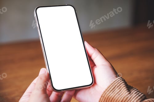 Preview: Mockup image of a woman holding mobile phone with blank desktop screen in cafe