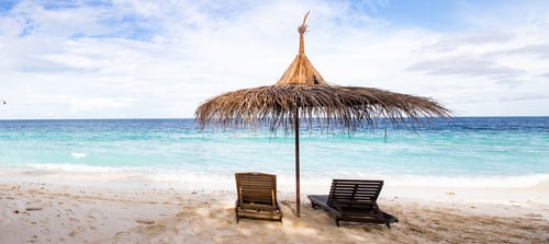 Preview: beach chairs on beautiful tropical beach