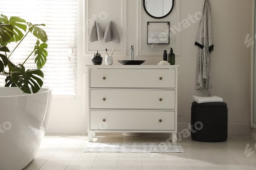 Preview: Stylish mat with pattern near chest of drawers in bathroom