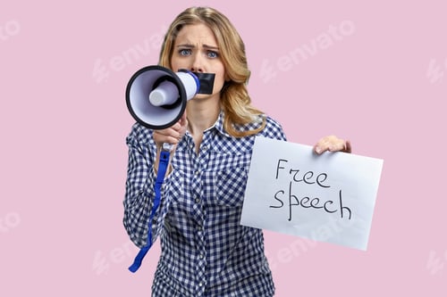 Preview: Young sad woman with taped mouth struggling to speak in megaphone.
