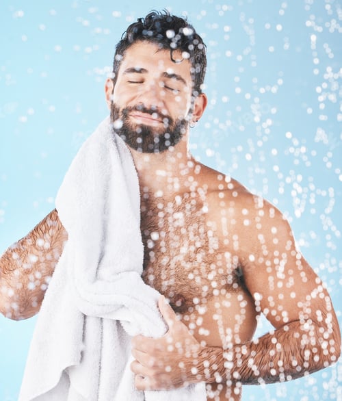 Preview: Clean, man with towel and beauty, body hygiene with bokeh overlay and grooming against blue backgro