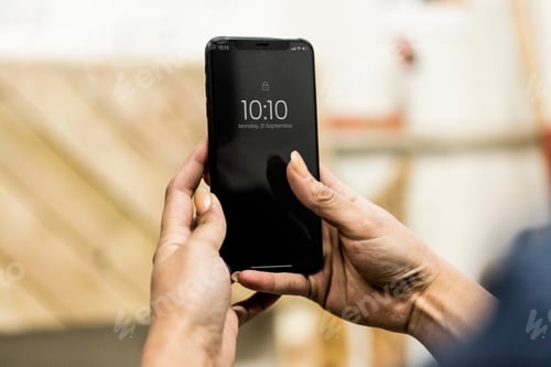 Preview: Mobile phone in a workshop
