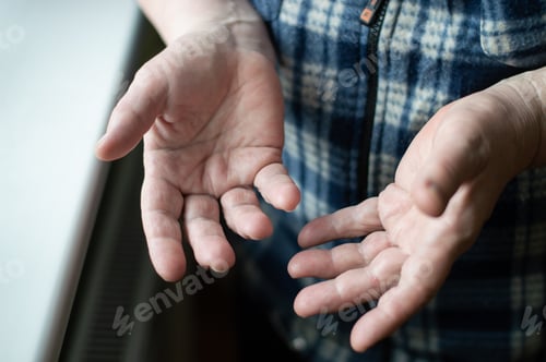 Preview: Hands close up. Hands of a middle aged woman. Senior wrinkled skin