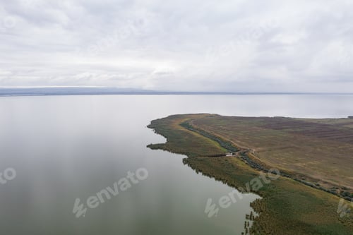 Preview: Landscape view of lake and shore.