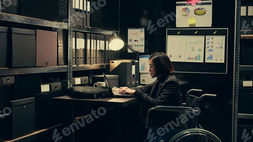 Preview: Wheelchair user and inspector analyzing criminal records in police archive room