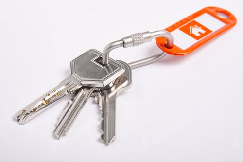 Preview: Key ring with keys over white background. Rent, buy