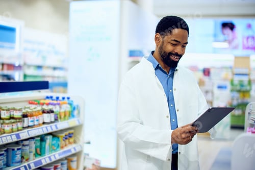Preview: Smiling Pharmacist Using a Tablet in a Modern Pharmacy Environment