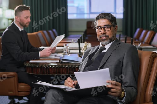 Preview: Experienced ceo reading paper documents