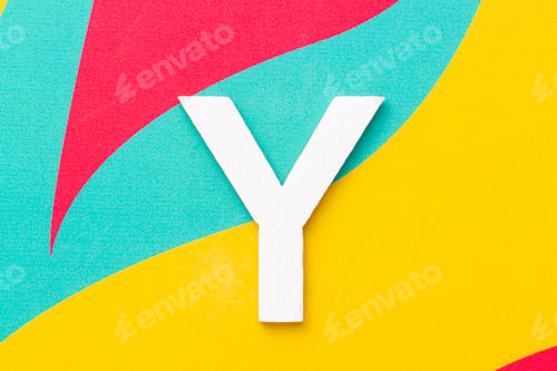 Preview: Letter Y of the alphabet on colored background, top view