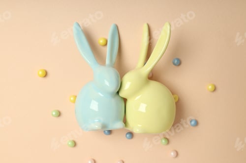 Preview: Easter bunnies on beige background, close up