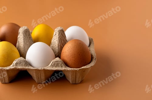 Preview: Naturally dyed easter eggs on beige background. Eco concept. Organic natural easter concept.
