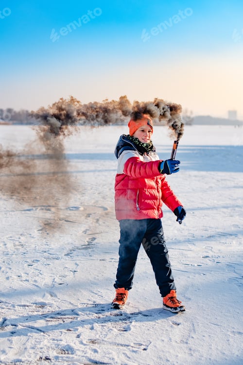 Preview: Boy with black smoke grenade in his hands