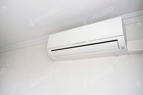 Preview: Modern air conditioner on white wall indoors