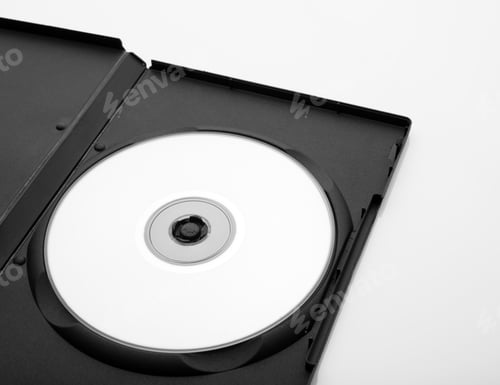 Preview: Opened Dvd Box With Empty Disc Over White Background