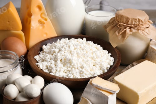 Preview: Different delicious dairy products on table, closeup