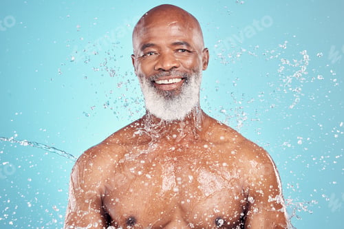 Preview: Grooming, smile and portrait of black man with a water splash isolated on a blue background. Shower