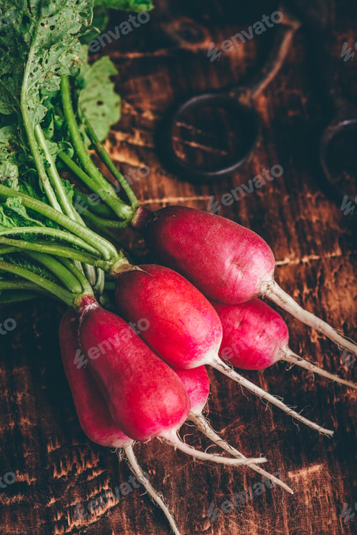 Preview: Red radish on cutting board