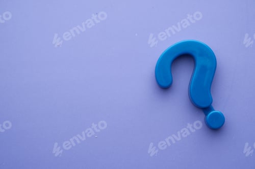 Preview: A Blue Plastic Question Mark Symbol Set Against a Light Purple Background, Creating Visual Interest