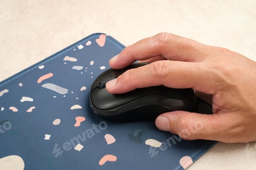 Preview: Hand using wireless computer mouse