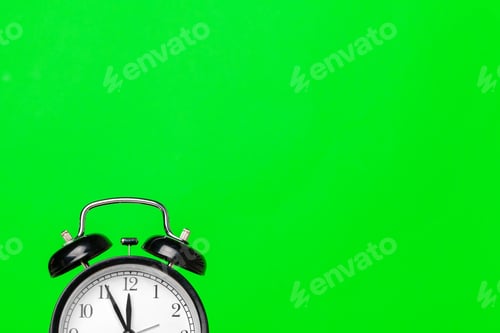 Preview: black vintage alarm clock on color background