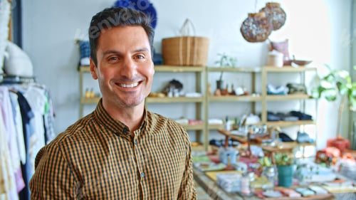 Preview: Portrait Of Smiling Male Owner Or Sales Assistant In Shop