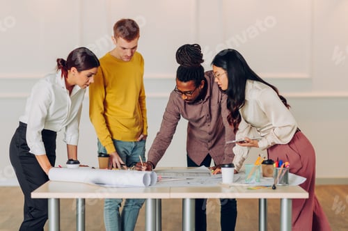Preview: Diverse group of engineers or architects having a meeting in an office