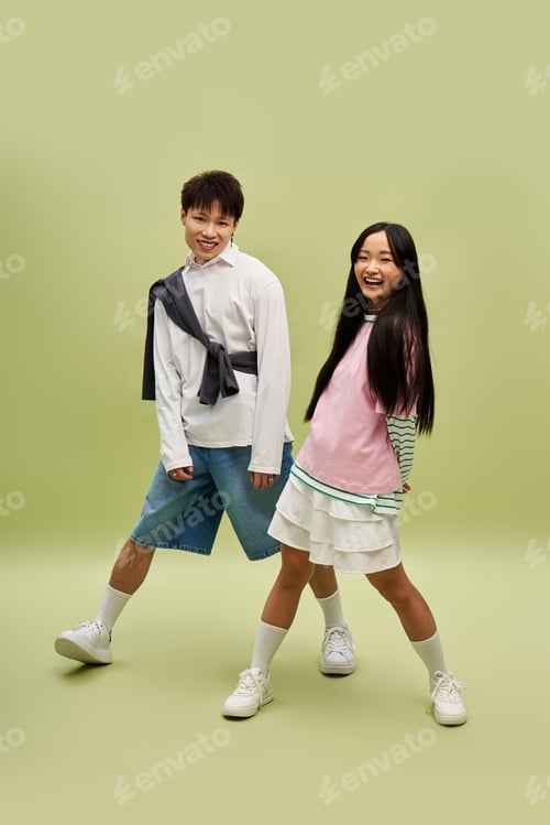 Preview: Stylish couple celebrating love in a vibrant backdrop with trendy fashion choices