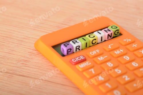 Preview: Calculator and Blocks Spelling Out Pricing, Business Concept