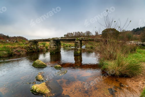 Preview: The ancient clapper bridge crossing the East Dart River at Postbridge