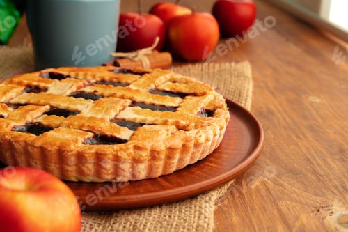 Preview: Close up of homemade traditional sweet autumn raspberry tart pie on wooden table