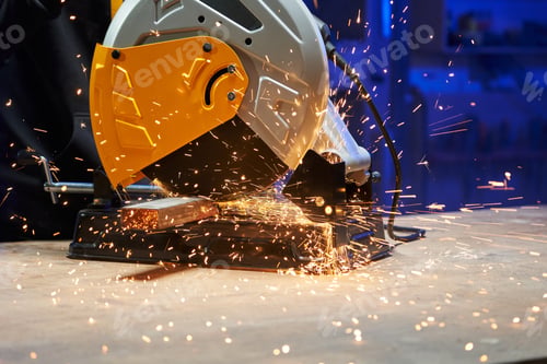 Preview: cuts a metal profile with a disk installed in a cutting machine. bright sparks fly in different