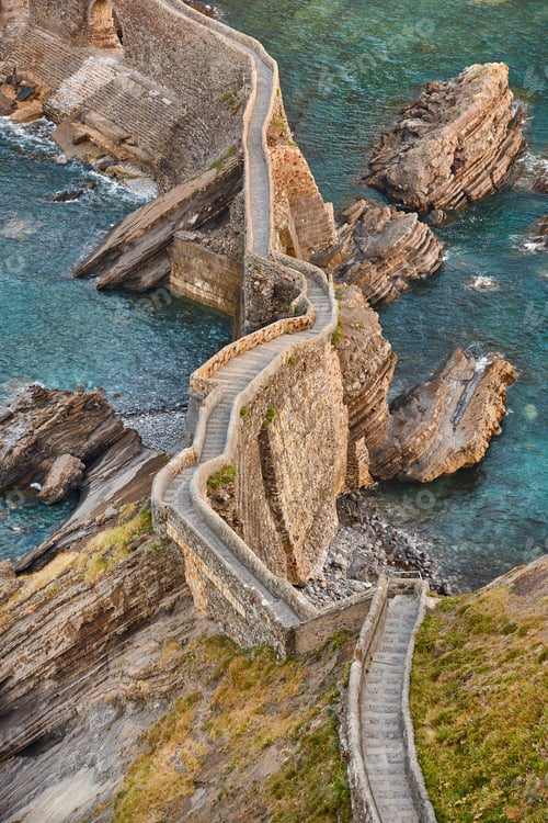 Preview: Sunset dramatic coastline in Spain. San Juan de Gaztelugatxe stairway