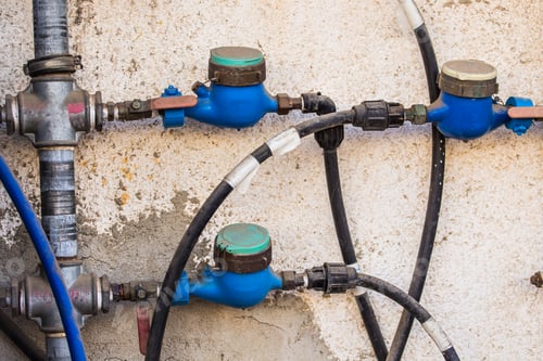 Preview: Water meters, sanitary equipment on dark background.