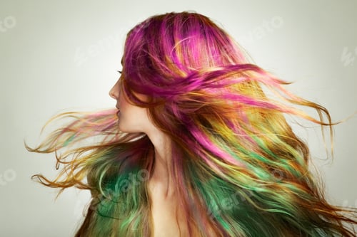 Vista previa: Portrait of young beautiful woman with long flying hair