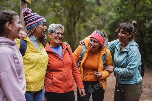Preview: Multi generational women having fun during hiking day in nature