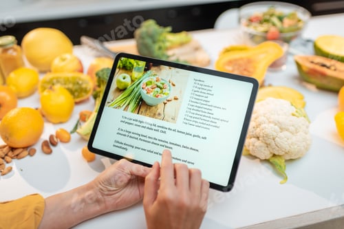 Preview: Cooking food using recipe on a digital tablet