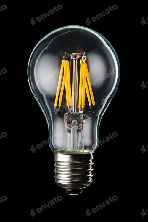 Preview: LED filament bulb on black background.