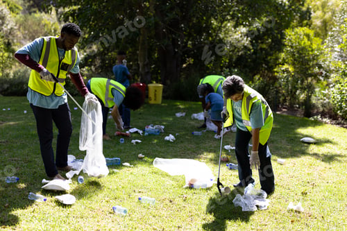 Preview: Multi-generation mixed race family collecting garbage