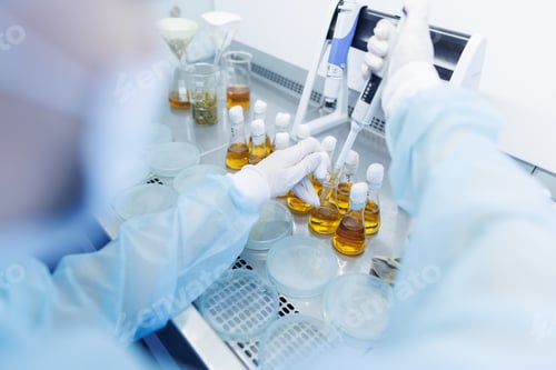 Preview: female laboratory assistant conducts research, chemical analysis, analysis of bacteria