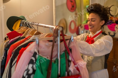 Preview: Woman shopping in clothes shop