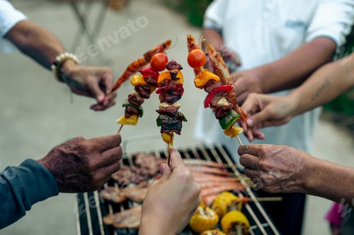 Preview: Home Garden BBQ Party, Wine Glasses Clink in Family Toast, enjoying harvest time together outside