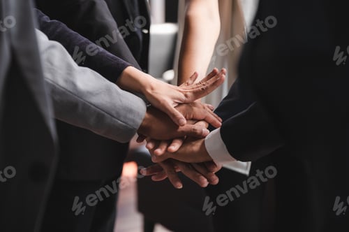 Preview: Business people shake hands together, Concept of team unity successful